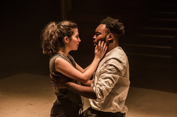 Norah Lopez Holden and Abraham Popoola on stage as Desdemona and Othello