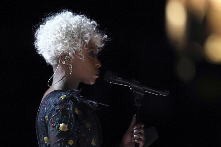 Cynthia Erivo prepares to sing into standing mic at the Grammy Awards ceremony